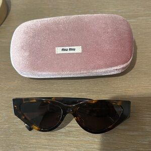 Miu Miu Brown Sunglasses with Sleek Design